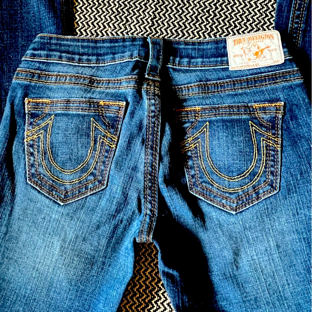 True Religion medium wash size 2 (26) skinny cut jeans